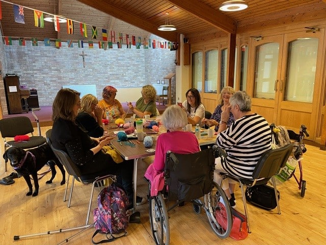 Group of people around a table at MS Society Gosport