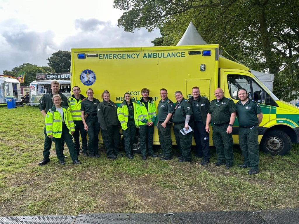 Medical team in front of ambulance