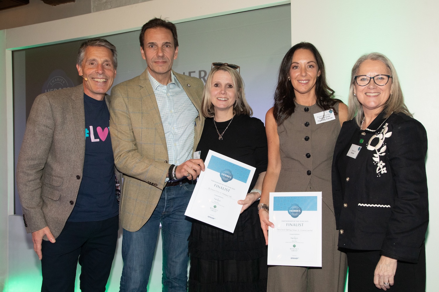 Berkshire Vision & Newbury Velo and Teens Unite Fighting Cancer & Kinovo Limited receiving their Charity Heroes Award