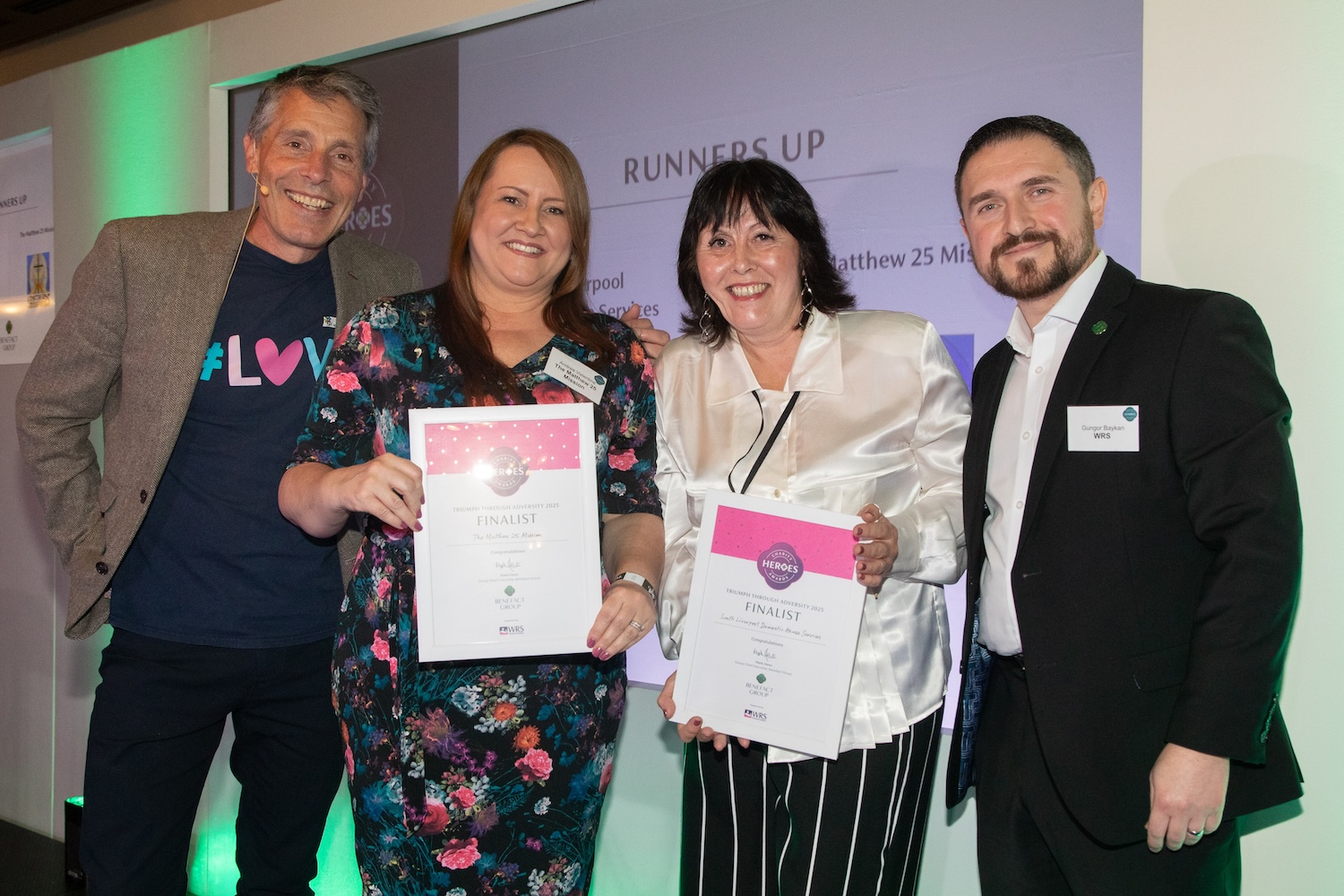 South Liverpool Domestic Abuse Services and The Matthew 25 Mission receiving their charity heroes award