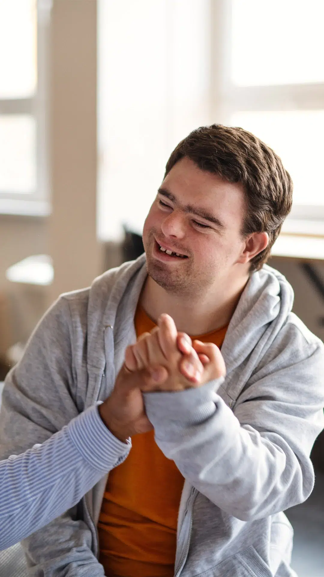 man holding a hand
